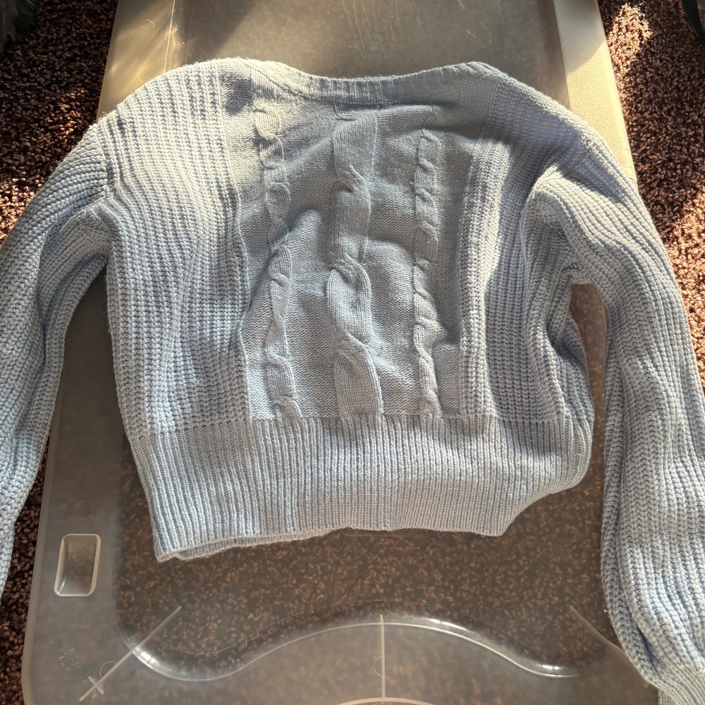 light blue women’s sweater